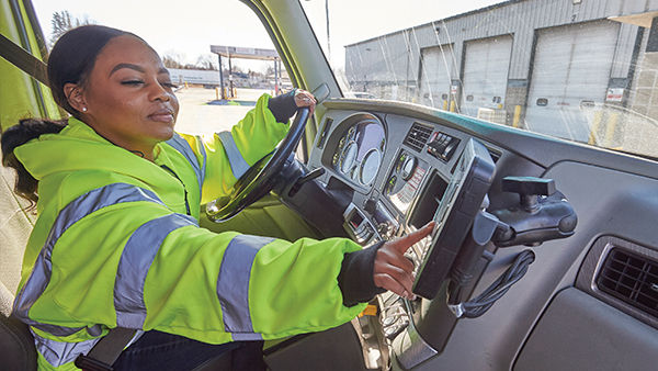 Woman getting truck ready to drive